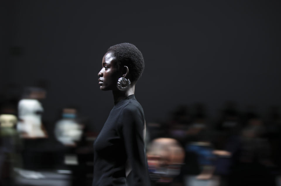 A model wears a creation as part of the Drome 2021 women's spring-summer ready-to-wear collection during the Milan's fashion week in Milan, Italy, Saturday, Sept. 26, 2020. (AP Photo/Luca Bruno)