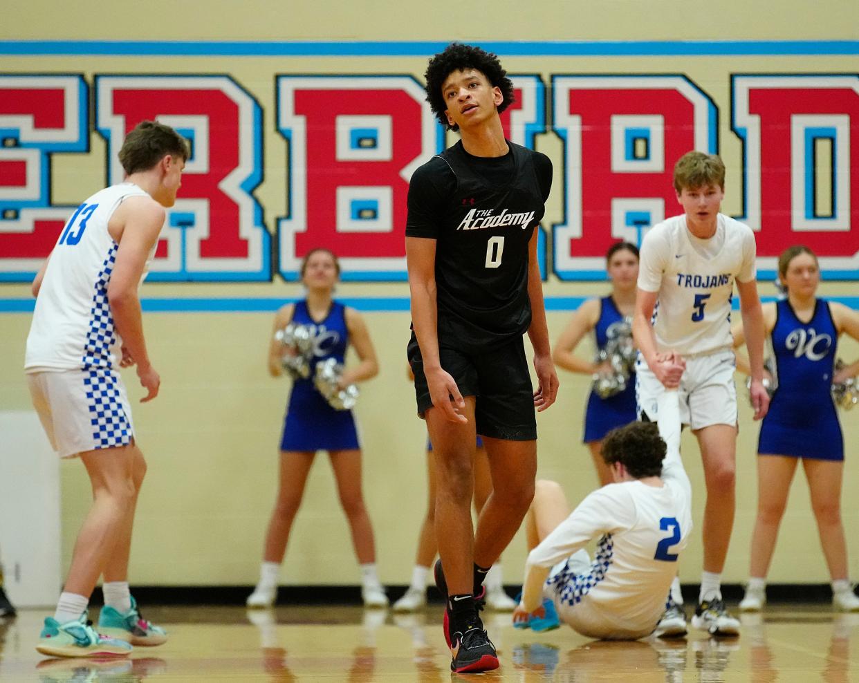 January 13, 2022; Mesa, Ariz; USA; Scottsdale Christian forward Elijah Williams (R) reacts to a charge call against Valley Christian during a game at Mesa Community College. 