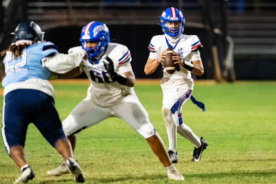 Keystone Heights' Baylor Ford prepares to throw a pass Thursday against P.K. Yonge.