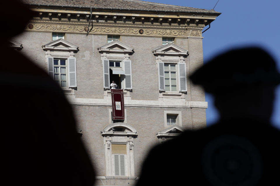 Pope Francis recites the Angelus prayer from his studio's window overlooking St. Peter's square at the Vatican, Monday, Jan. 6, 2020. (AP Photo/Andrew Medichini)