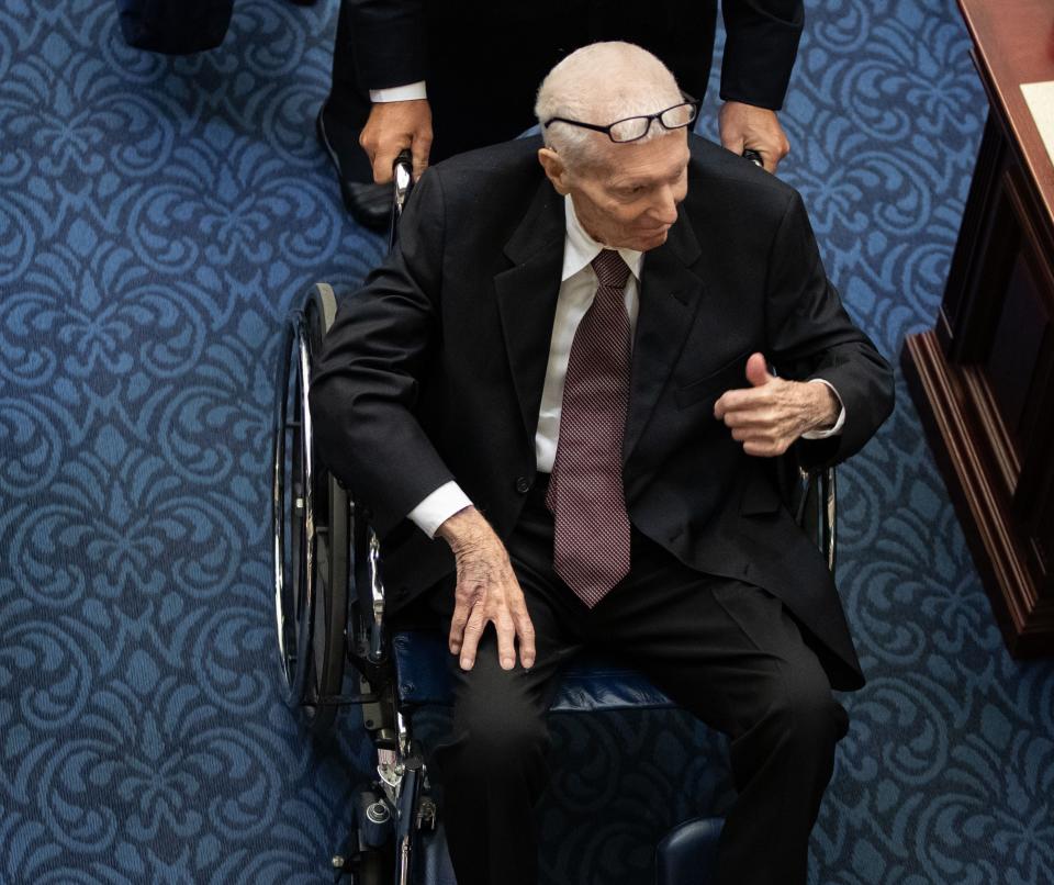 Richard Morgan, husband of legendary reporter Lucy Morgan, gives a thumbs-up on his way out of the Chamber of the Florida House of Representatives following a memorial service for his wife on Friday, Sept. 29, 2023.