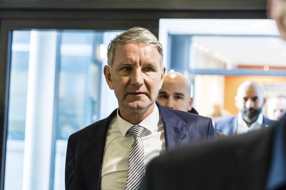 German far-right politician of the Alternative for Germany (AfD) Björn Höcke arrives for a session of his trial over the alleged use of Nazi phrases, at the regional court in Halle, eastern Germany, on Tuesday, April 23, 2024. Höecke, one of the most prominent figures in the far-right Alternative for Germany party, went on trial last Thursday on charges of using a Nazi slogan, months before a regional election in which he plans to run to become his state's governor. (Jens Schlueter/Pool Photo via AP)