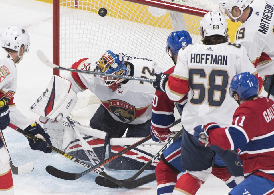 Florida Panthers goaltender Sergei Bobrovsky is scored on by Montreal Canadiens' Tomas Tatar (90) as Panthers' Mike Hoffman (68), Mike Matheson (19) Dominic Toninato (14) and Canadiens' Brendan Gallagher look for the rebound during the second period of an NHL hockey game, Saturday, Feb. 1, 2020 in Montreal. (Graham Hughes/The Canadian Press via AP)