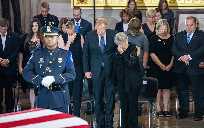 The family of Woodrow “Woody” Williams pay their respects as he lies in honor