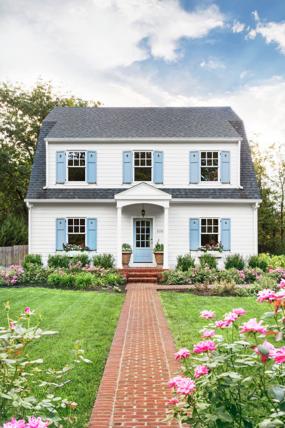 country home with blue shutters