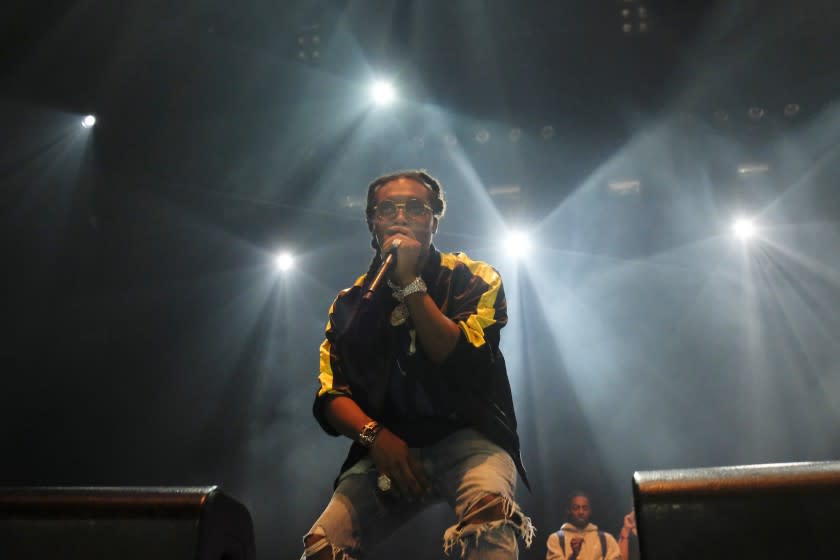 LOS ANGELES, CA JANUARY 19, 2017: Takeoff with the hip-hop trio Migos on stage at the Novo club in Los Angeles, CA January 18, 2017. (Francine Orr/ Los Angeles Times)