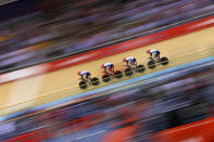 LONDON, ENGLAND - AUGUST 02: Geraint Thomas, Steven Burke, Edward Clancy, and Peter Kennaugh of Great Britain post a new world record time during Men's Team Pursuit Track Cycling Qualifying on Day 6 of the London 2012 Olympic Games at Velodrome on August 2, 2012 in London, England. (Photo by Cameron Spencer/Getty Images)