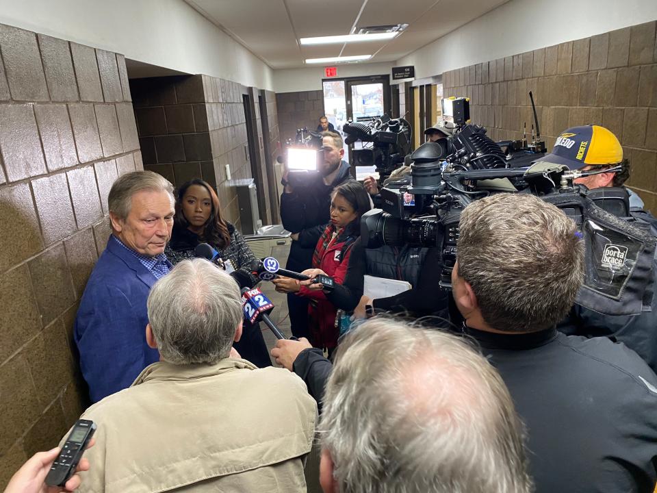 Gregg Hardy, left, brother of missing Dee Warner, talks to reporters Wednesday, Nov. 22, 2023, at the Rex B Martin Judicial Building in Adrian following the arraignment of Dale Warner on charges he murdered Dee Warner and tampered with evidence.