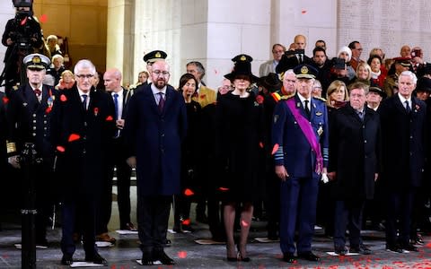 Queen Mathilde and King Philippe of Belgium during the Last Post ceremony at the Commonwealth War Graves Commission in Ypres - Credit:  NICOLAS MAETERLINCK/AFP