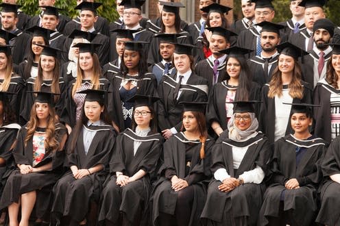 <span class="caption">GE</span> <span class="attribution"><a class="link " href="https://www.alamy.com/stock-photo-graduates-from-many-different-cultures-graduating-from-university-111892545.html?pv=1&stamp=2&imageid=7CC137BB-FEEA-4B1A-BFEB-627CF8AA2A14&p=56108&n=96&orientation=0&pn=1&searchtype=0&IsFromSearch=1&srch=foo%3Dbar%26st%3D0%26sortby%3D2%26qt%3Duniversity%2520graduates%26qt_raw%3Duniversity%2520graduates%26qn%3D%26lic%3D3%26edrf%3D0%26mr%3D0%26pr%3D0%26aoa%3D1%26creative%3D%26videos%3D%26nu%3D%26ccc%3D%26bespoke%3D%26apalib%3D%26ag%3D0%26hc%3D0%26et%3D0x000000000000000000000%26vp%3D0%26loc%3D2%26ot%3D0%26imgt%3D0%26dtfr%3D%26dtto%3D%26size%3D0xFF%26blackwhite%3D%26cutout%3D%26archive%3D1%26name%3D%26groupid%3D%26pseudoid%3D%26userid%3D%26id%3D%26a%3D%26xstx%3D0%26cbstore%3D1%26resultview%3DsortbyPopular%26lightbox%3D%26gname%3D%26gtype%3D%26apalic%3D%26tbar%3D1%26pc%3D%26simid%3D%26cap%3D1%26customgeoip%3DGB%26vd%3D0%26cid%3D%26pe%3D%26so%3D%26lb%3D%26pl%3D0%26plno%3D%26fi%3D0%26langcode%3Den%26upl%3D0%26cufr%3D%26cuto%3D%26howler%3D%26cvrem%3D0%26cvtype%3D0%26cvloc%3D0%26cl%3D0%26upfr%3D%26upto%3D%26primcat%3D%26seccat%3D%26cvcategory%3D*%26restriction%3D%26random%3D%26ispremium%3D1%26flip%3D0%26contributorqt%3D%26plgalleryno%3D%26plpublic%3D0%26viewaspublic%3D0%26isplcurate%3D0%26imageurl%3D%26saveQry%3D%26editorial%3D%26t%3D0%26filters%3D1" rel="nofollow noopener" target="_blank" data-ylk="slk:Imagedoc/Alamy;elm:context_link;itc:0;sec:content-canvas">Imagedoc/Alamy</a></span>