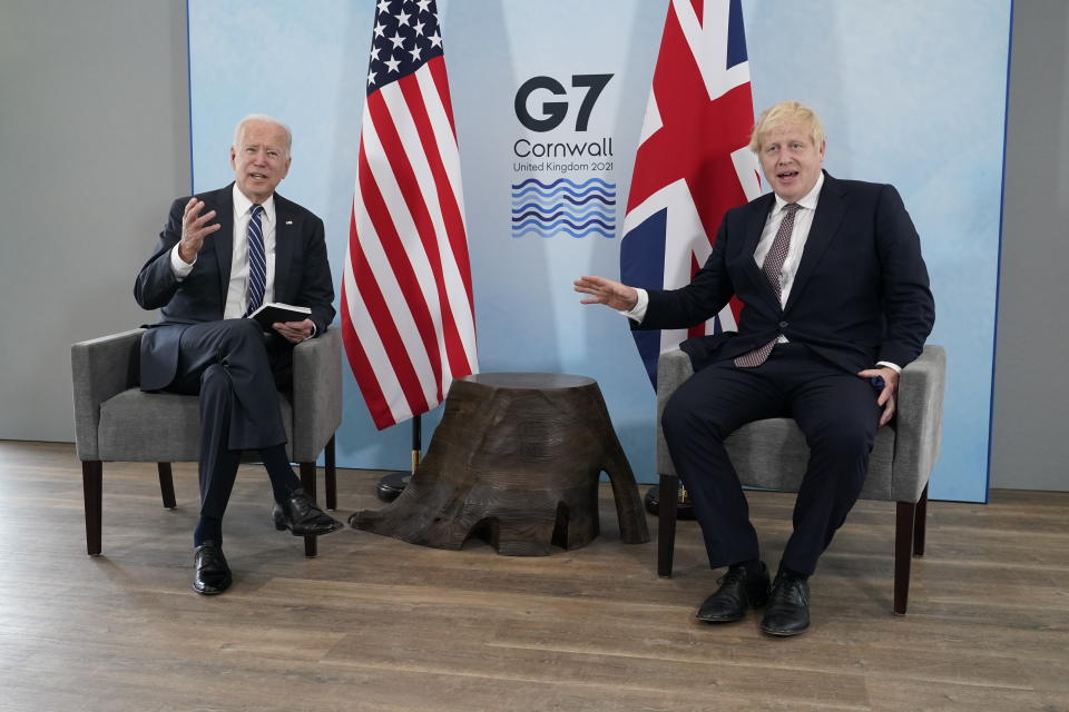 President Joe Biden and British Prime Minister Boris Johnson visit during a bilateral meeting ahead of the G-7 summit, Thursday, June 10, 2021, in Carbis Bay, England. (AP Photo/Patrick Semansky)