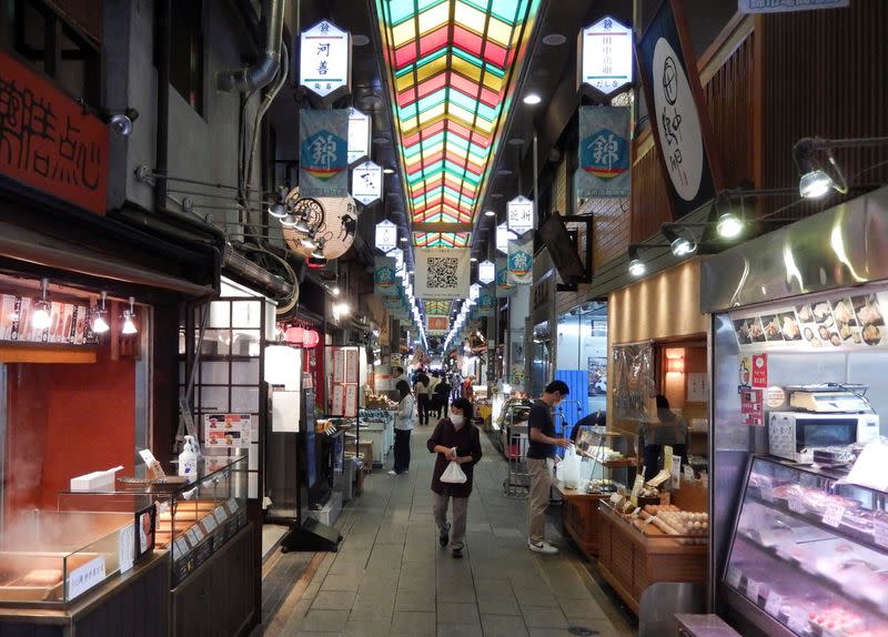 Shoppers are seen at Nishiki Market in Kyoto, Japan