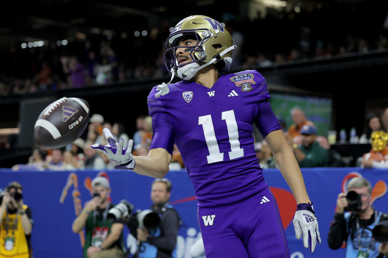 NEW ORLEANS, LOUISIANA - JANUARY 01: Jalen McMillan #11 of the Washington Huskies reacts after a touchdown during the third quarter against the Texas Longhorns during the CFP Semifinal Allstate Sugar Bowl at Caesars Superdome on January 01, 2024 in New Orleans, Louisiana. (Photo by Jonathan Bachman/Getty Images)