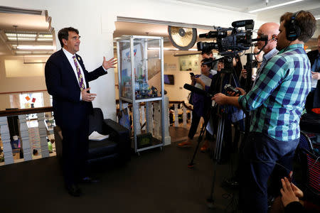 Venture capitalist and CAL 3 Chairman Tim Draper speaks during a press conference after announcing he has collected more than 600,000 signatures to put the plan to partition California into three states into the November ballot in San Mateo, California, April 12, 2018. REUTERS/ Stephen Lam