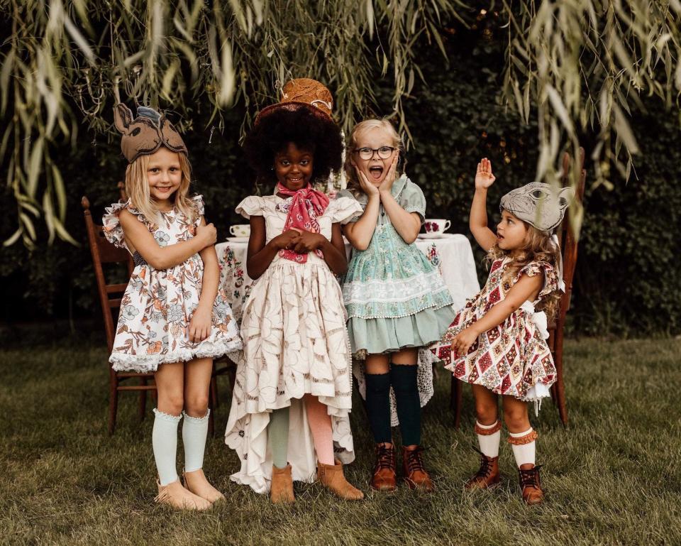 A group of girls, Roosevelt, Erika, Winter and Cecilia, modeling some of the styles offered by The Wild Purple