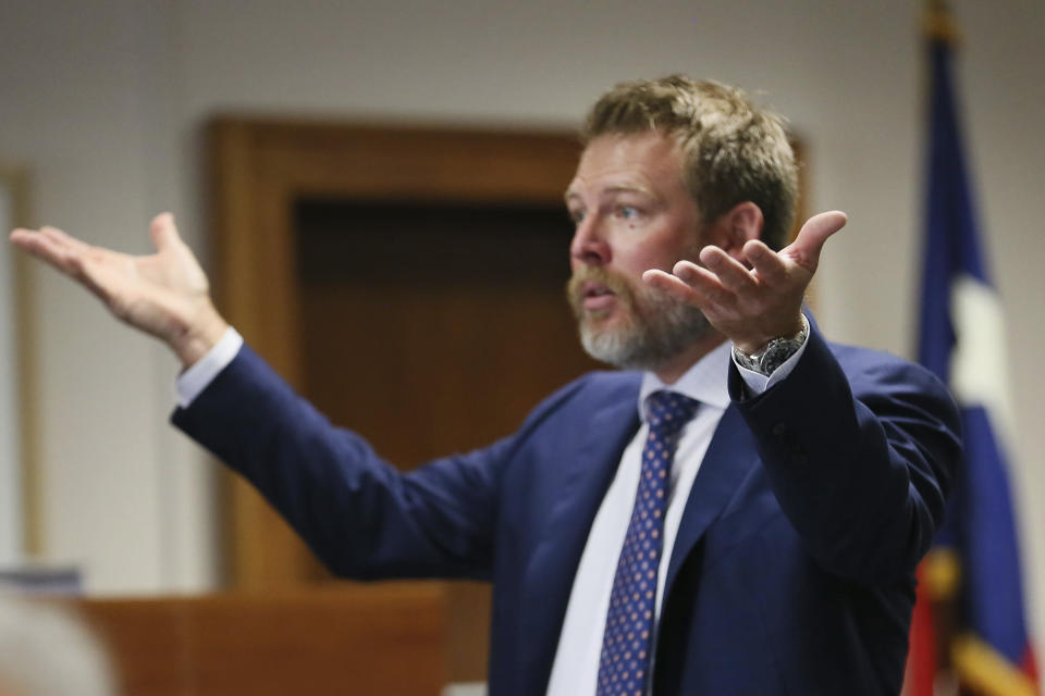 Wesley Ball tells jurors the scales are imbalanced when it comes to evidence provided while giving closing arguments Friday, Aug. 5, 2022, at the Travis County Courthouse in Austin, Texas. Jurors were asked to assess punitive damages against InfoWars host Alex Jones after awarding $4.1 million in actual damages to the parents of Jesse Lewis on Thursday. (Briana Sanchez/Austin American-Statesman via AP, Pool)