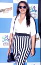 Sonakshi Sinha The striped pencil skirt and the plain white shirt makes the actress look slimmer and turns up the edge too!