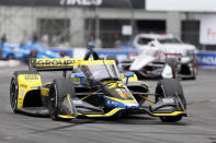 Colton Herta (26) takes Turn 10 during an IndyCar auto race at the Grand Prix of Long Beach, Sunday, Sept. 26, 2021, in Long Beach, Calif. (AP Photo/Alex Gallardo)