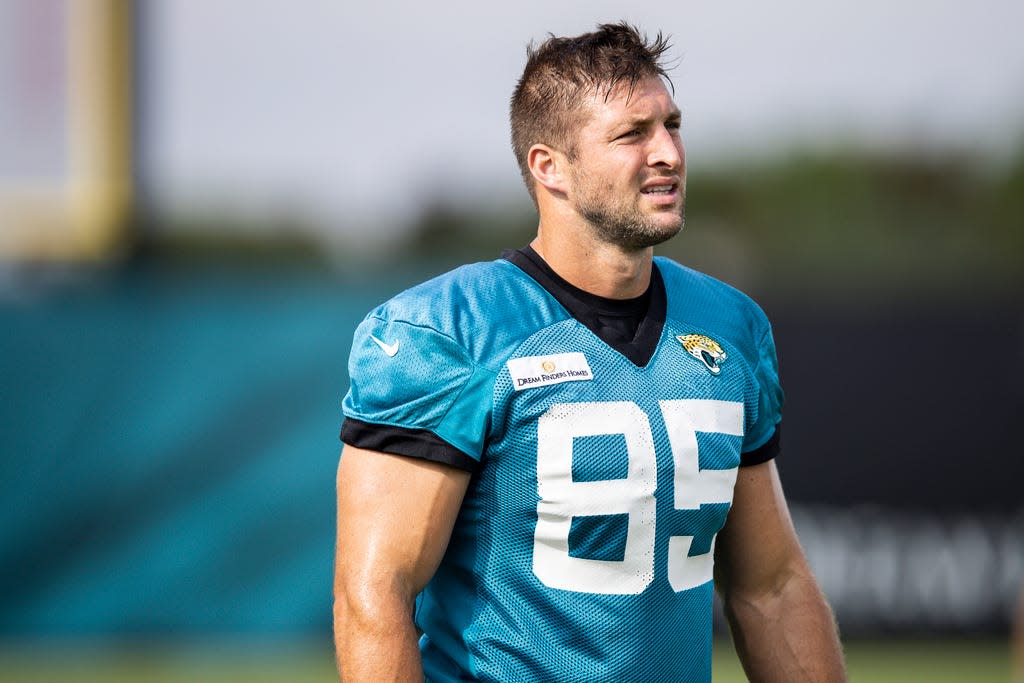 Tim Tebow #85 of the Jacksonville Jaguars looks on during Training Camp at TIAA Bank Field on July 30, 2021 in Jacksonville, Florida.