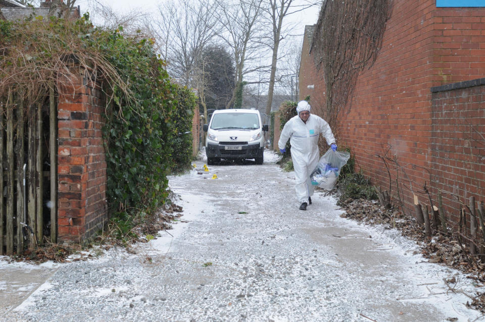 Police officer at work after making the grim discovery earlier this week (Caters)