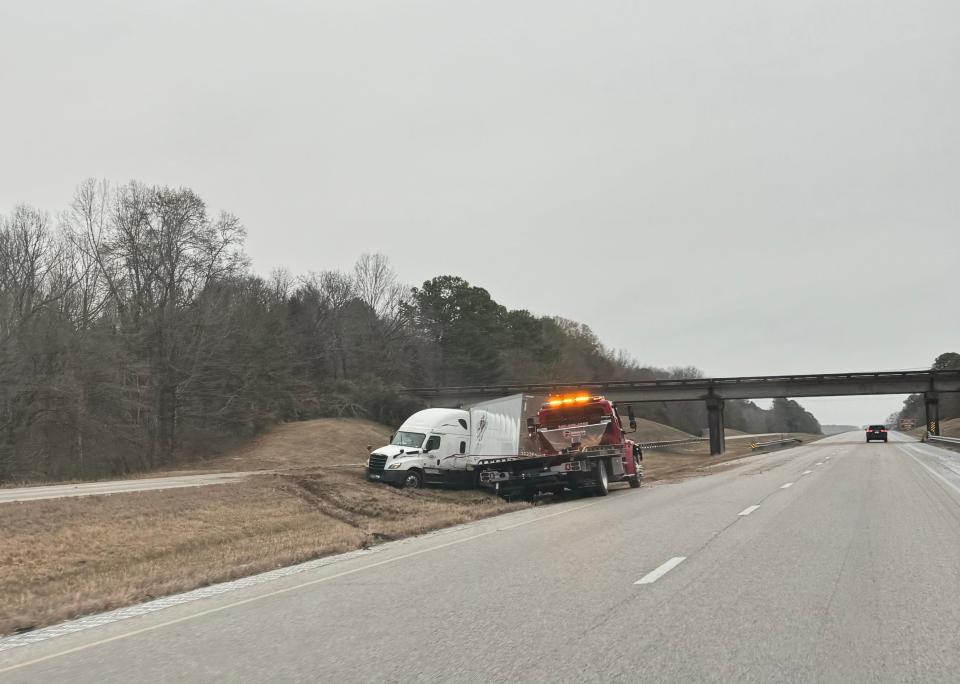 A truck slid off Interstate 55 near Batesville in icy conditions on Sunday. The northern parts of Mississippi woke up to bone-chilling temperatures in the teens on Monday.