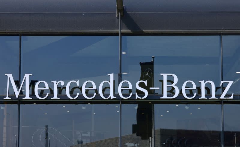 FILE PHOTO: The logo of Mercedes-Benz is seen outside a Mercedes-Benz car dealer in Brussels, Belgium