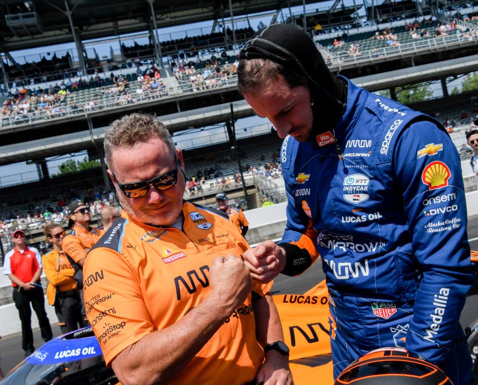 Arrow McLaren SP driver Alexander Rossi (7) gets a fist bump after finishing his first qualifying run Saturday, May 20, 2023, during first day of qualifying ahead of the 107th running of the Indianapolis 500 at Indianapolis Motor Speedway. 