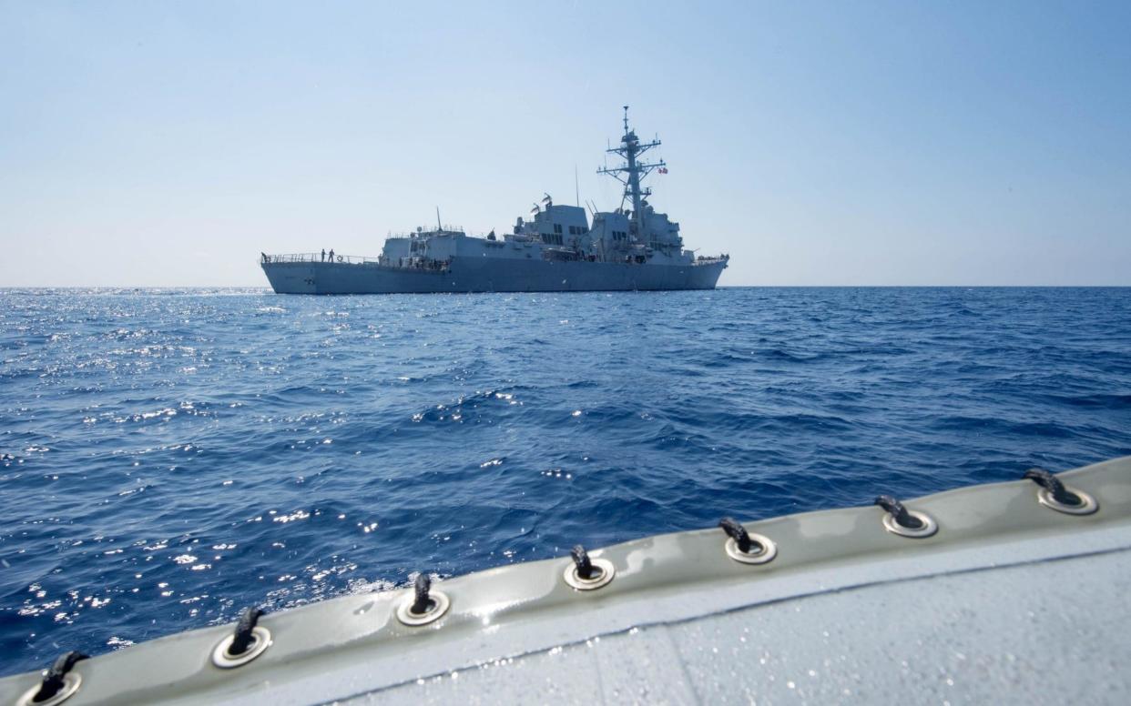 Arleigh Burke-class guided-missile destroyer USS Dewey transits the South China Sea May 6, 2017. - REUTERS