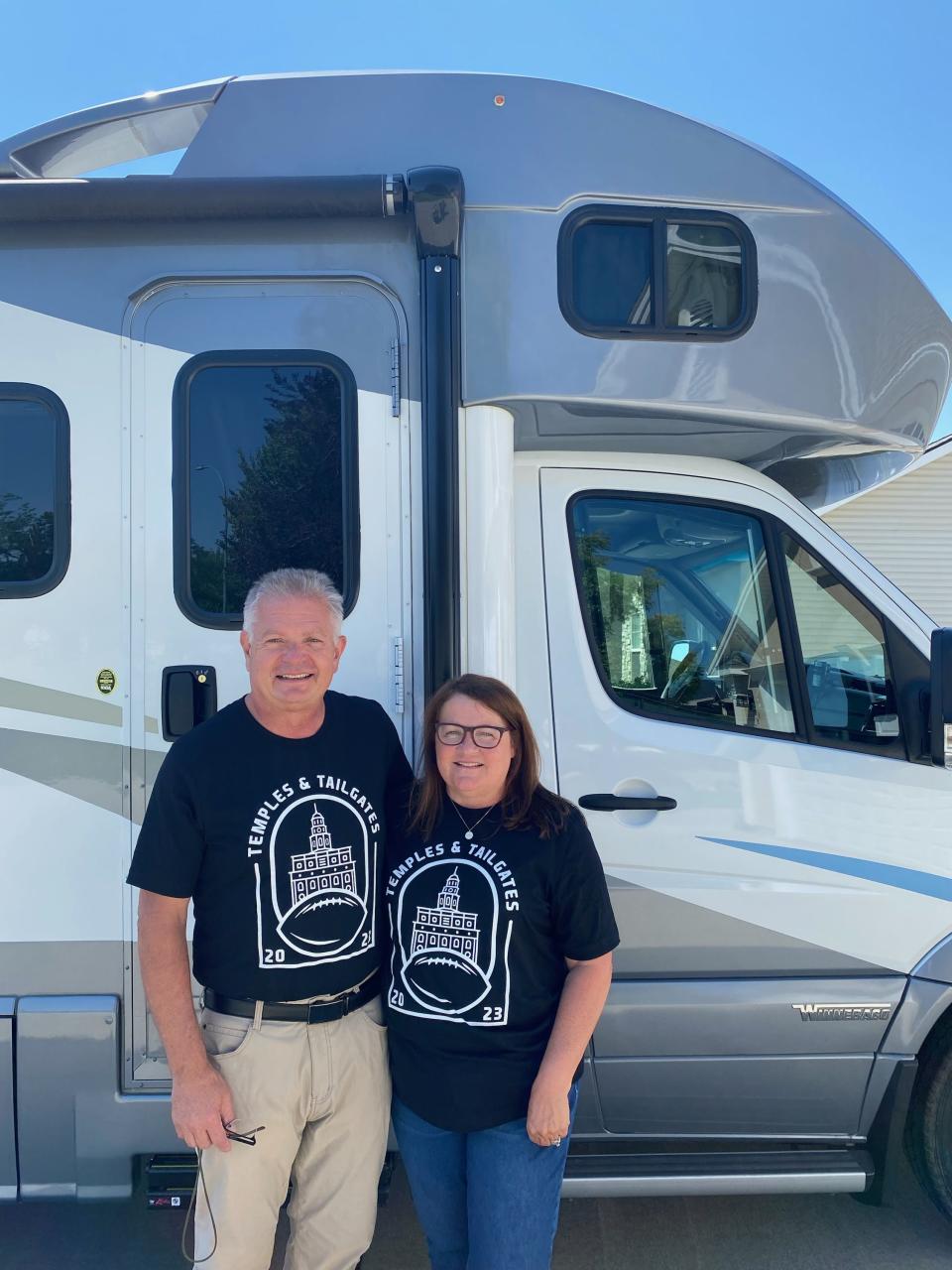 David and Karen Potter stand by the motor home they purchased for their “Temples and Tailgates” road trip. | Potter family