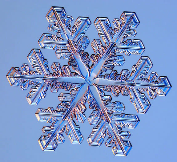 Kenneth Libbrecht, a professor of physics at California Institute of Technology, photographs snowflakes in the field and in his lab. Studio-type lighting, even outdoors, brings out angles, texture and color that are otherwise hard to spot.