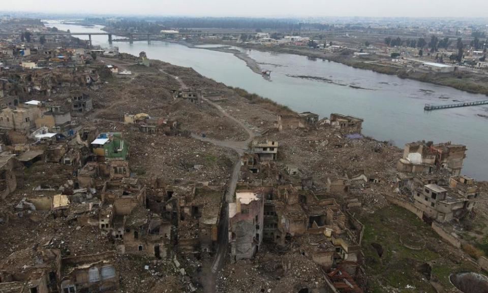 An aerial view shows the Tigris River and destroyed buildings in the war-ravaged old part of Mosul Islamic State fighters in the battle for the city.