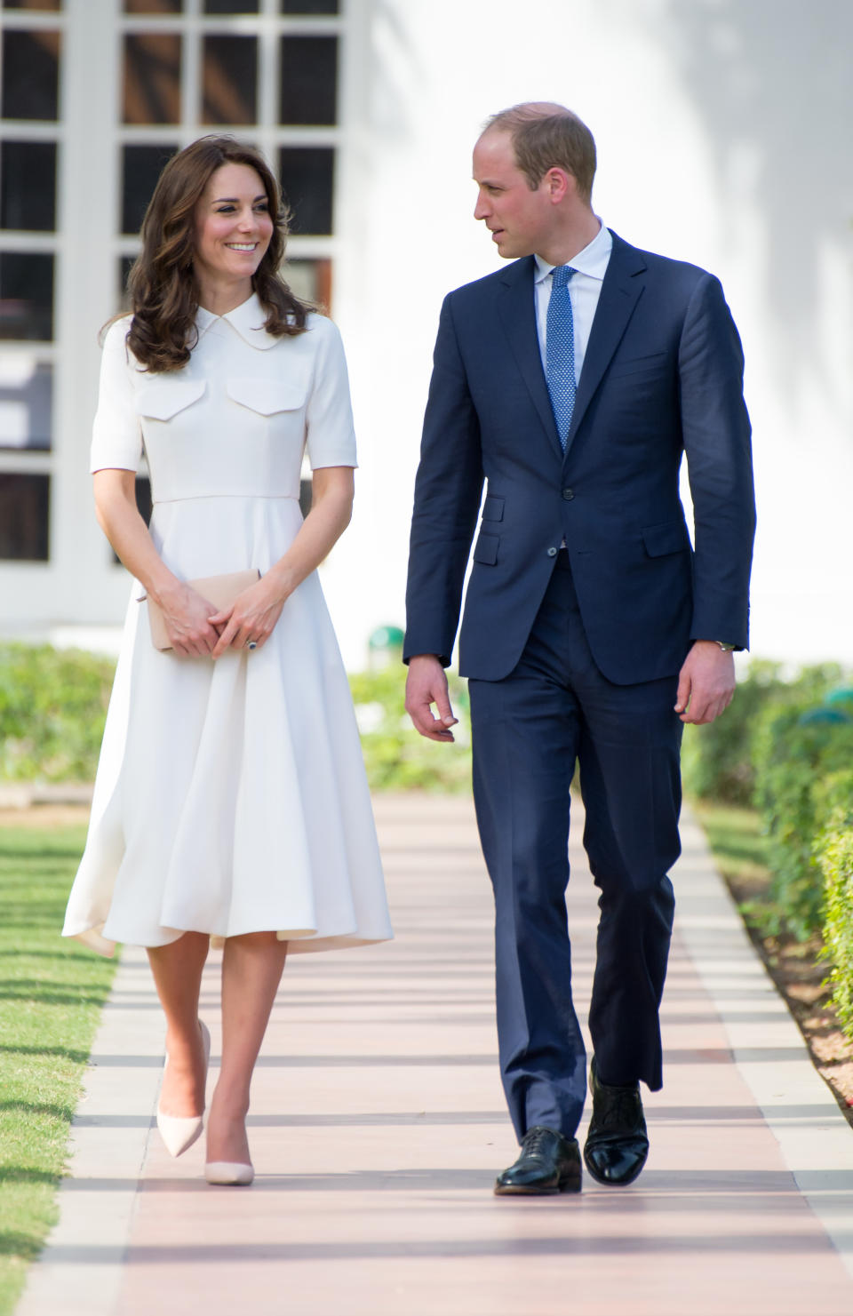 <p>The Duchess chose a white ensemble by Emilia Wickstead along with neutral Rupert Sanderson heels for a trip to a war memorial in India. <em>[Photo: Getty]</em> </p>