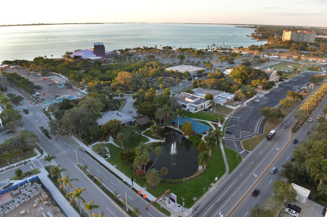 A recent photo of the Van Wezel Performing Arts Hall, its parking lot and surrounding areas. The city of Sarasota will use a newly awarded grant to elevate Van Wezel Way, restore a creek and protect the shoreline from flooding.