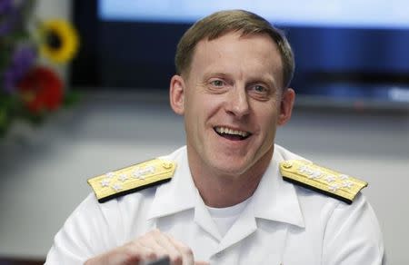 National Security Agency (NSA) Director Admiral Michael Rogers smiles at a Reuters CyberSecurity Summit in Washington May 12, 2014. REUTERS/Larry Downing