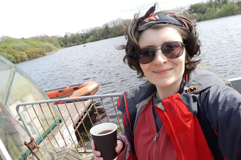 Sofie Jackson enjoying a cup of tea after the paddleboarding lesson at Kelsey Lakes and Gardens