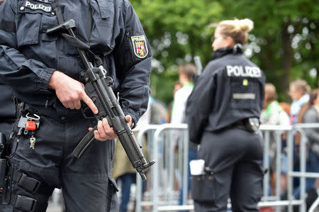 Police patrol before an opening service of the German protestant church congress Kirchentag in front of the Brandenburg Gate in Berlin, Germany, May 24, 2017. REUTERS/Fabian Bimmer