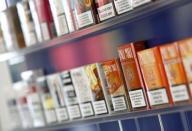 Pall Mall cigarettes are seen after the manufacturing process in the British American Tobacco Cigarette Factory (BAT) in Bayreuth, southern Germany, in this April 30, 2014 file photograph. REUTERS/Michaela Rehle