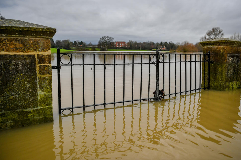 Floodwater surrounding Tewkesbury Abbey, where flood watches are in place with more wet weather expected in the coming days.