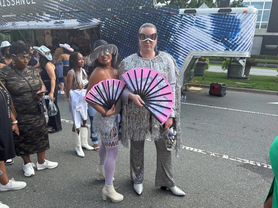 From left, Kitty Hear and Gavin Jambora show off their Renaissance outfit for Beyoncé at Bank of America Stadium in Charlotte on Wednesday, August 9, 2023.