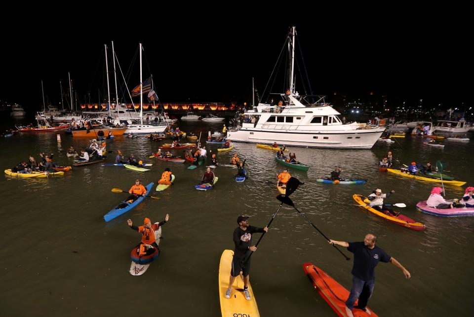 SAN FRANCISCO, CA - OCTOBER 24: San Francisco Giants fans cheer on boats and kayaks in McCovey Cove during Game One between the San Francisco Giants and the Detroit Tigers in the Major League Baseball World Series at AT&T Park on October 24, 2012 in San Francisco, California. (Photo by Ezra Shaw/Getty Images)