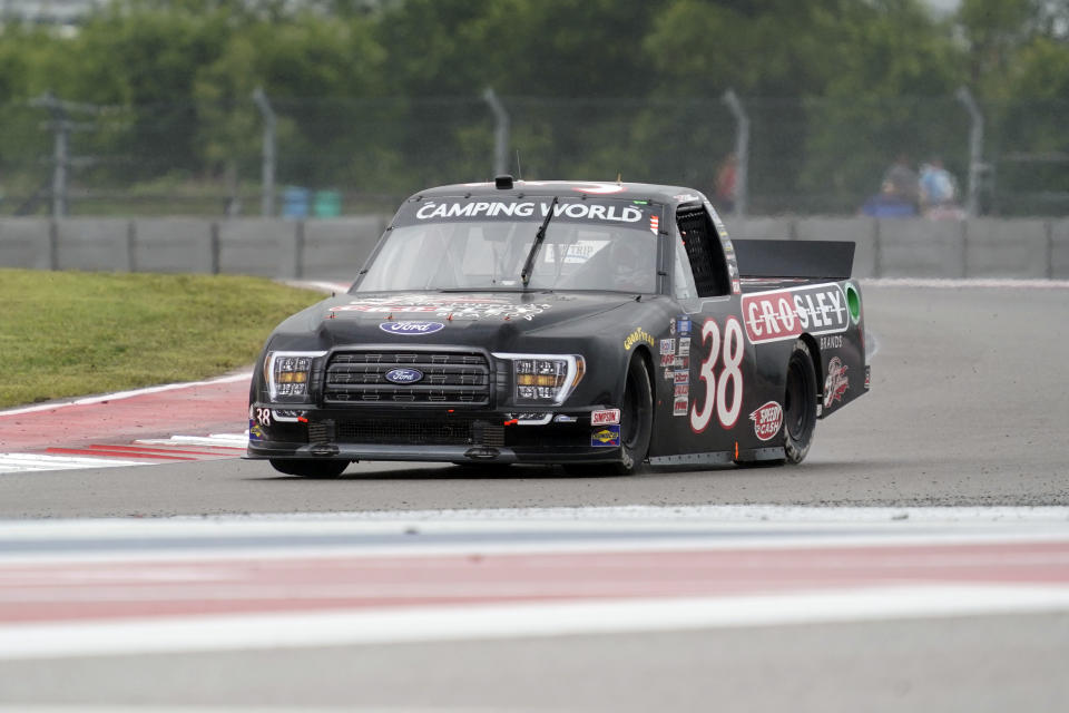 Todd Gilliland (38) drives out of Turn 17 during the NASCAR Truck Series auto race at the Circuit of the Americas in Austin, Texas, Saturday, May 22, 2021. (AP Photo/Chuck Burton)