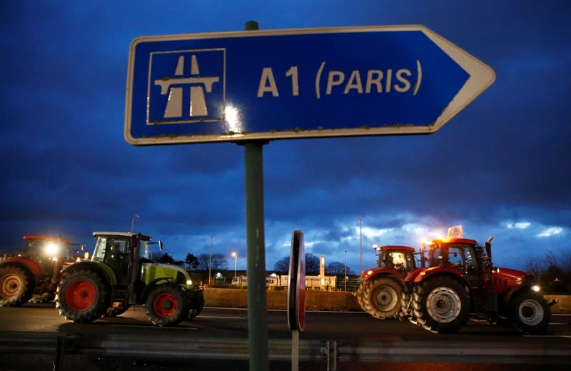 French farmers drive on the A1 Lille-Paris motorway during a protest near Vemars