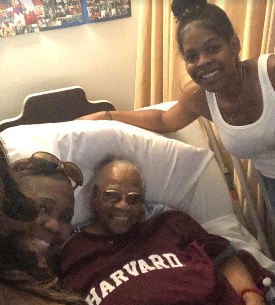 The author and her family visiting her great-grandmother (center) at her nursing home last summer. The author gave her great-grandmother a Harvard T-shirt before she started medical school. (Photo: Courtesy of LaShyra “Lash” Nolen)