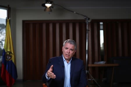 Colombia's President Ivan Duque speaks during an interview with Reuters in Bogota