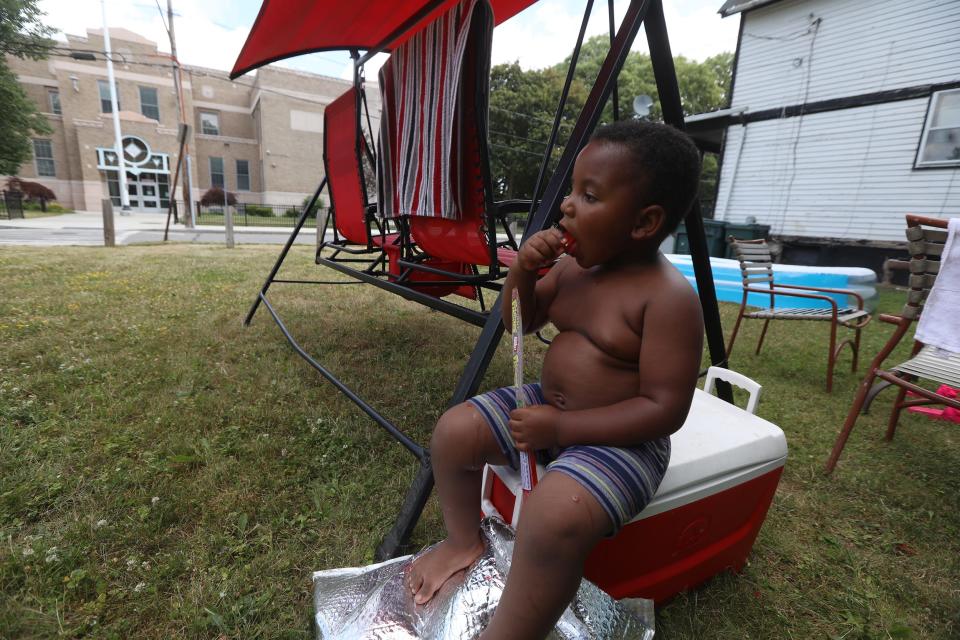 Elias Windom, 3, enjoyed a frozen treat on Dr. Samuel McCree Way in Rochester on June 28, 2021, during an especially hot spell.