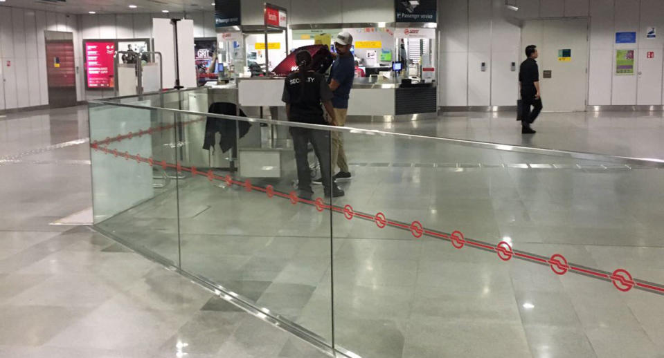 Yahoo News Singapore’s Senior Correspondent Safhras Khan had his luggage checked by a security officer stationed at Holland Village MRT station. Photo: Dhany Osman/Yahoo News Singapore