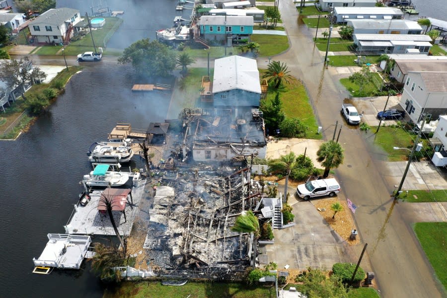 HUDSON, FLORIDA – AUGUST 30: In an aerial view, a home smolders after burning as Hurricane Idalia passed offshore on August 30, 2023 in Hudson, Florida. Hurricane Idalia hit the Big Bend area as a Category 3 storm on the Gulf Coast of Florida. (Photo by Joe Raedle/Getty Images)