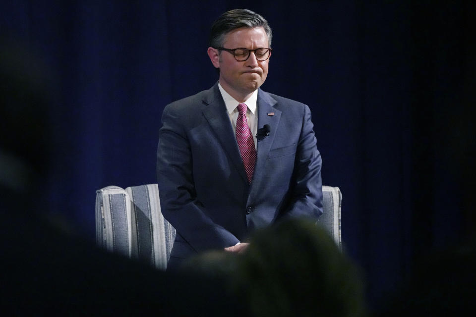 House Speaker Mike Johnson bows his head in prayer during an event in Flowood, Miss., hosted by the National Apostolic Christian Leadership Conference, April 25, 2024. (AP Photo/Rogelio V. Solis)