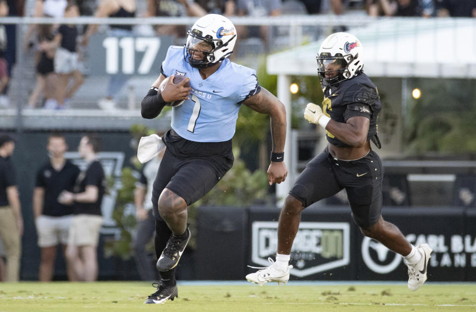 FILE - Central Florida quarterback KJ Jefferson, (1) runs the ball upfield during the NCAA college football team's spring game Friday, April 12, 2024, in Orlando, Fla. Jefferson, who transferred from Arkansas, takes over at quarterback for the Knights after throwing for 7,923 yards and 67 touchdowns while also running for 1,876 yards and 21 TDs in 44 games the past five seasons in the SEC.(Willie J. Allen Jr./Orlando Sentinel via AP, File)