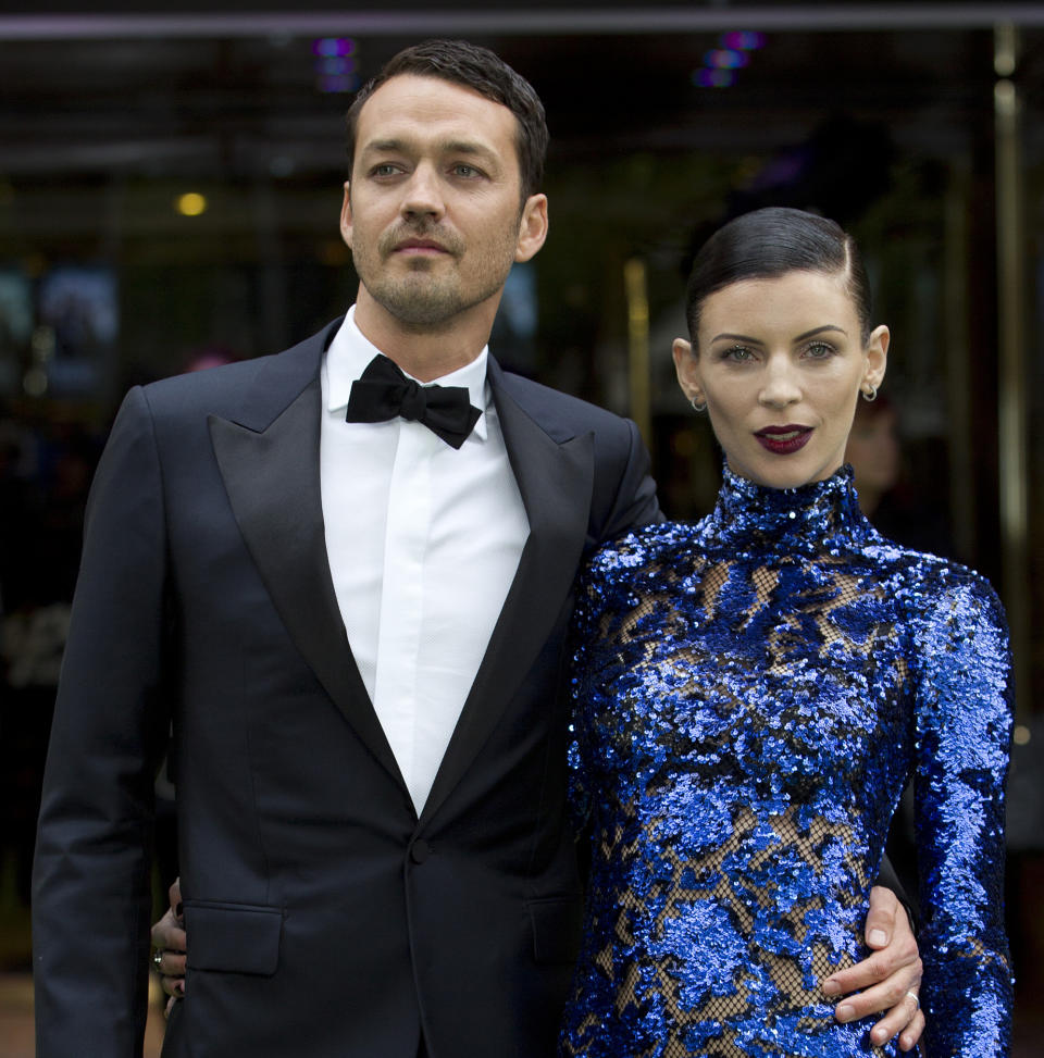 FILE - In this May 14, 2012 file photo, actress Liberty Ross with director Rupert Sanders pose for the media at the World Premiere of the film, "Snow White and the Huntsman," at a cinema in central London. Ross filed for divorce on Friday, Jan. 28, 2013 in Los Angeles, roughly five months after it was revealed that Sanders had engaged in a brief affair with actress Kristen Stewart. (AP Photo/Alastair Grant, File)